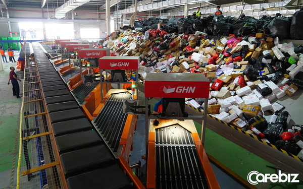 GHN ra mắt hệ thống phân loại hàng tự động 100% lớn nhất tại Việt Nam: Năng suất 30.000 đơn/giờ, tiết kiệm 600 nhân công, rút ngắn thời gian từ 3 giờ còn 30 phút - Ảnh 1.