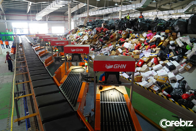 GHN ra mắt hệ thống phân loại hàng tự động 100% lớn nhất tại Việt Nam: Năng suất 30.000 đơn/giờ, tiết kiệm 600 nhân công, rút ngắn thời gian từ 3 giờ còn 30 phút - Ảnh 3.